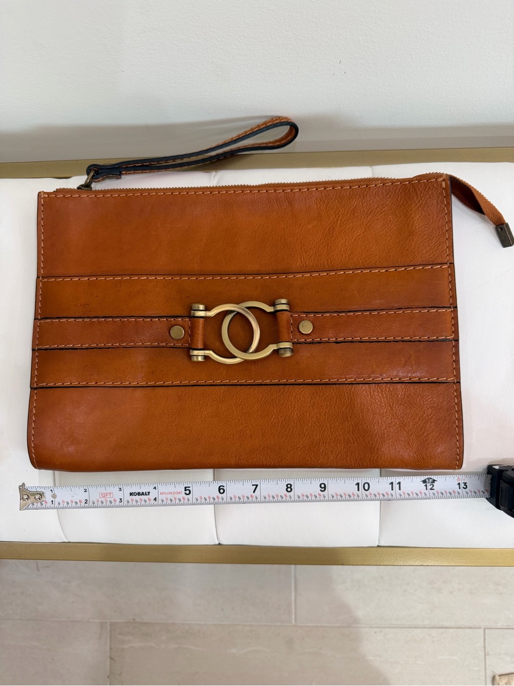 Pratesi Raggioli Tan Leather Wristlet Clutch with Gold Accents. Excellent cond